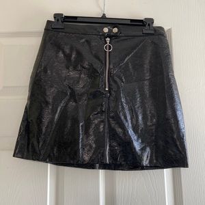 Black faux leather mini skirt with zipper detail